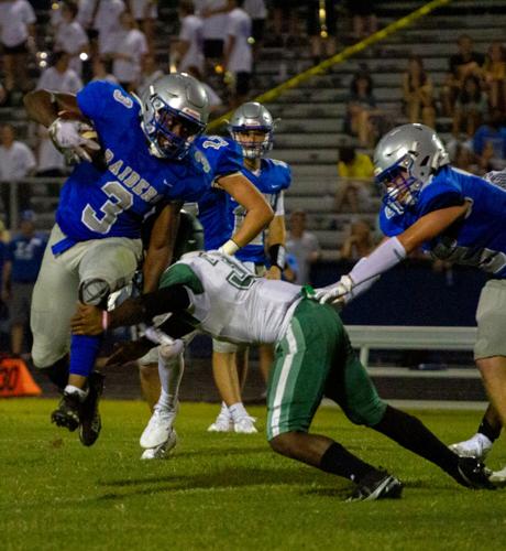 Henrico at Atlee football: Warren gets away