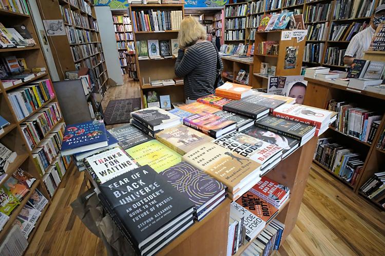 Owner of Chop Suey Books selling the shop, along with WonTon the cat