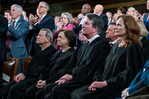 From left, Supreme Court Chief Justice John G. Roberts Jr., Justice Elena Kagan, Justice Neil Gorsuch and Justice Amy Coney Barrett watch as President Donald J. Trump delivers the first State of the Union address of his second term to a joint session