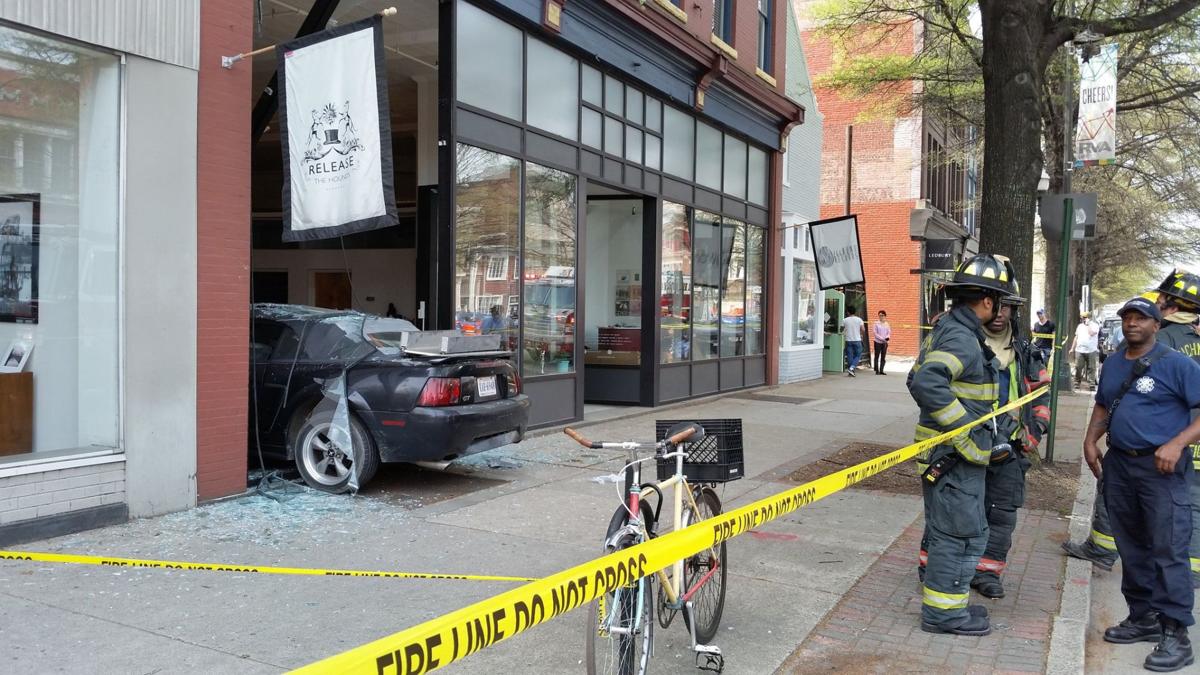 PHOTOS Car crashes into building on Broad St. in downtown Richmond