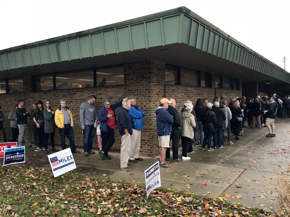 Voters line up to cast ballots at Robious Elementary School in Midlothian.