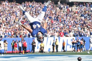 Sep 28, 2025; East Rutherford, New Jersey, USA; New York Giants running back Cam Skattebo (44) celebrates after scoring a two point conversion during the third quarter against the Los Angeles Chargers at MetLife Stadium. Mandatory Credit: Vincent Car