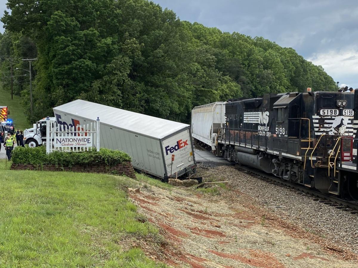 WATCH NOW FedEx tractor trailer and Norfolk Southern train collide in
