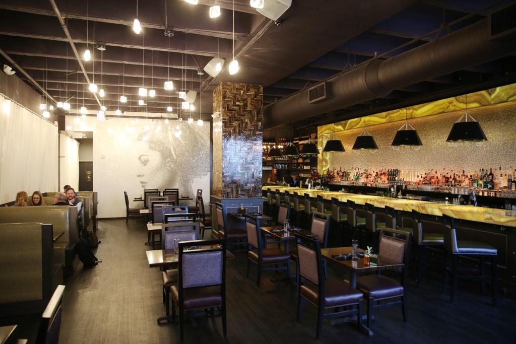 Two new hotels opening in former office tower on Main Street ...