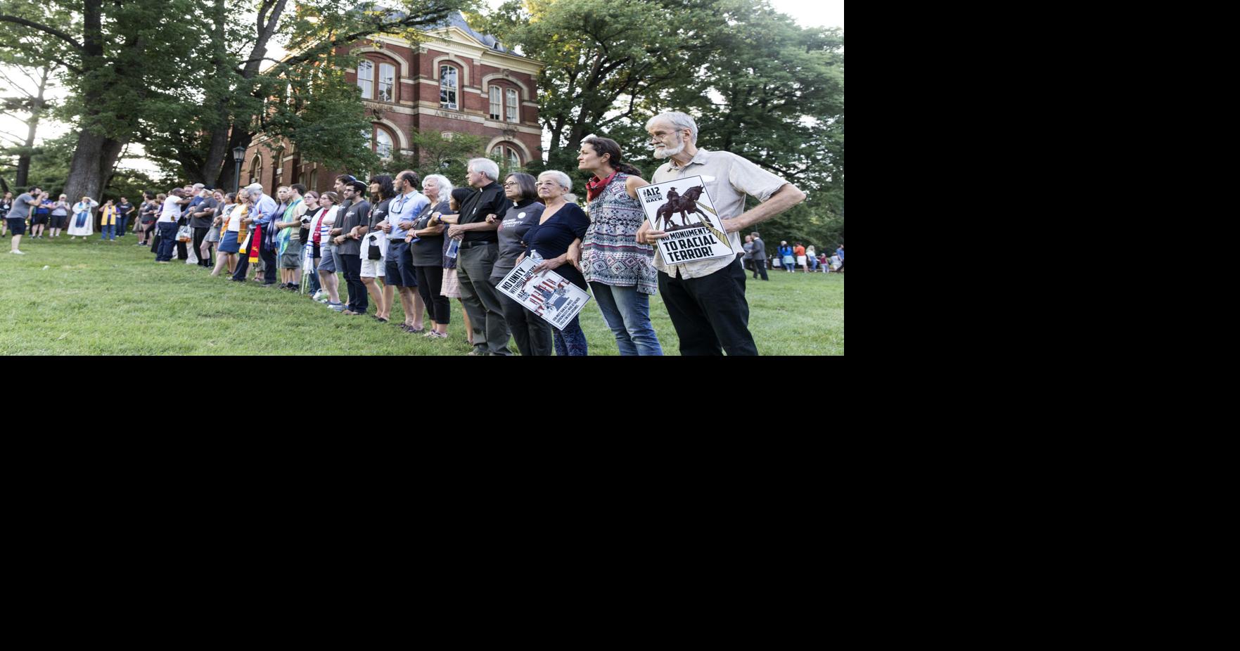 Hundreds march peacefully in Charlottesville to protest last year's ...