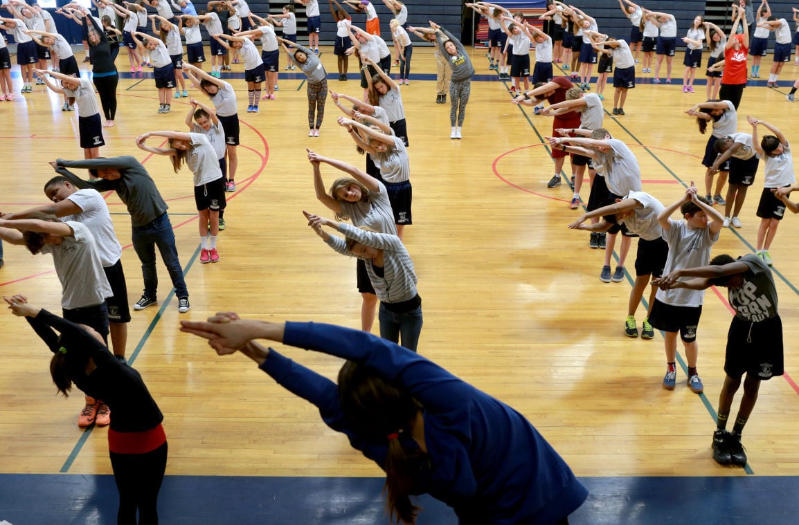 Henrico students try out yoga in gym class