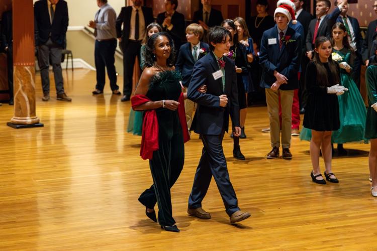 Dr. Lydia Johnson being escorted by junior assistant Garrick A.