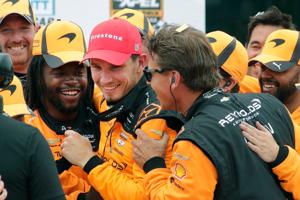 Christian Lundgaard (7),  center, celebrates his victory with his team following the XPEL Grand Prix at Road America, Sunday,