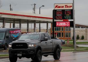 Gas prices are seen as traffic passes by on Monday, April 27, 2026, at Kwik Trip in Green Bay, Wis. Tork Mason/USA TODAY
