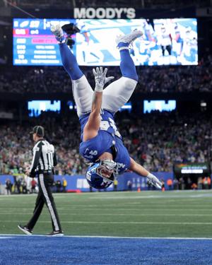 New York Giants running back Cam Skattebo (44) celebrates his touchdown against the Philadelphia Eagles during the fourth quarter at MetLife Stadium.