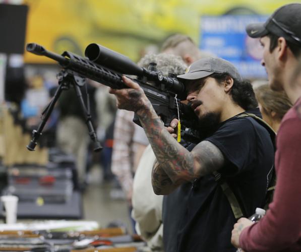 Gun show bustles; 'fear of Democrats