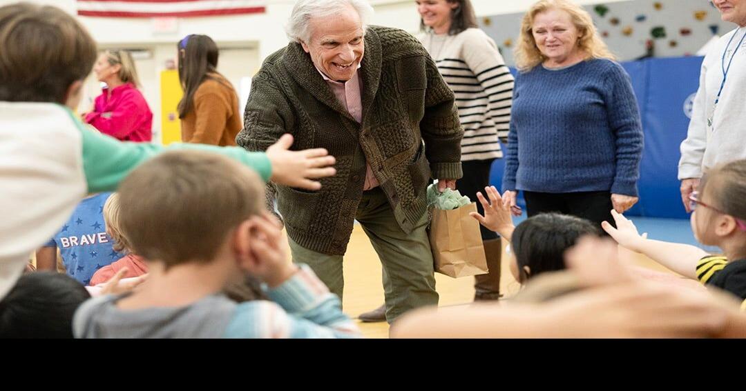 Henry "Fonzie" Winkler talks to Watkins Elementary School students