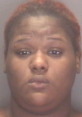 Woman arrested in stabbing death