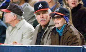 Oct 23, 1999; Atlanta, GA, USA; Former U.S. President Jimmy Carter (left) shares the box with Atlanta Braves owner Ted Turner and Turner's wife Jane Fonda during the first game of the 1999 World Series at Turner Field. Mandatory Credit: Robert Hanash