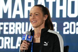 Jenny Simpson speaks at a press conference in 2024.
