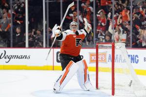 Philadelphia Flyers goalie Dan Vladar celebrates after a 1-0 overtime win in Game 6 against the Pittsburgh Penguins to clinch a trip to the second round.