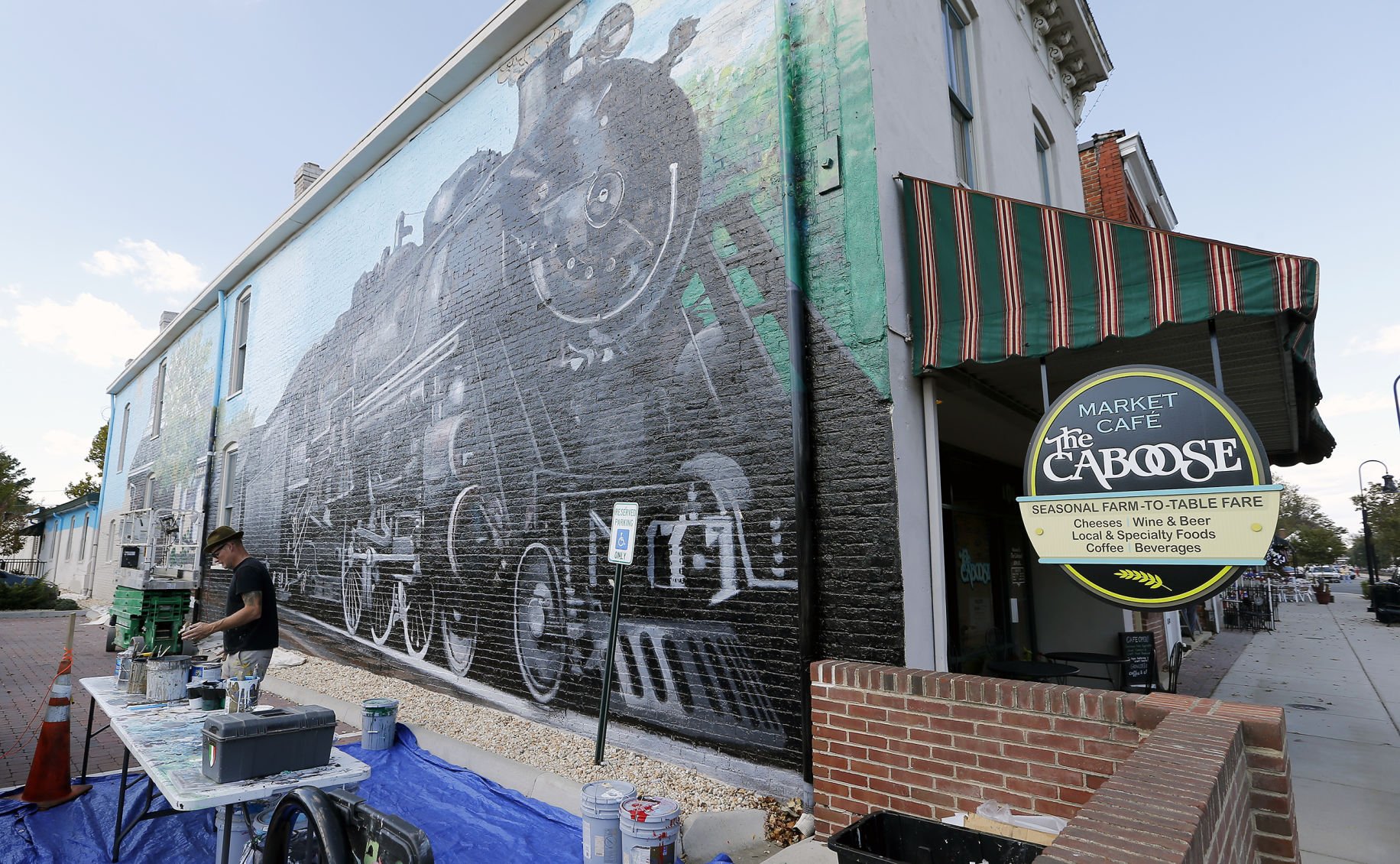 Sprawling train mural honors engineer who left mark on Ashland