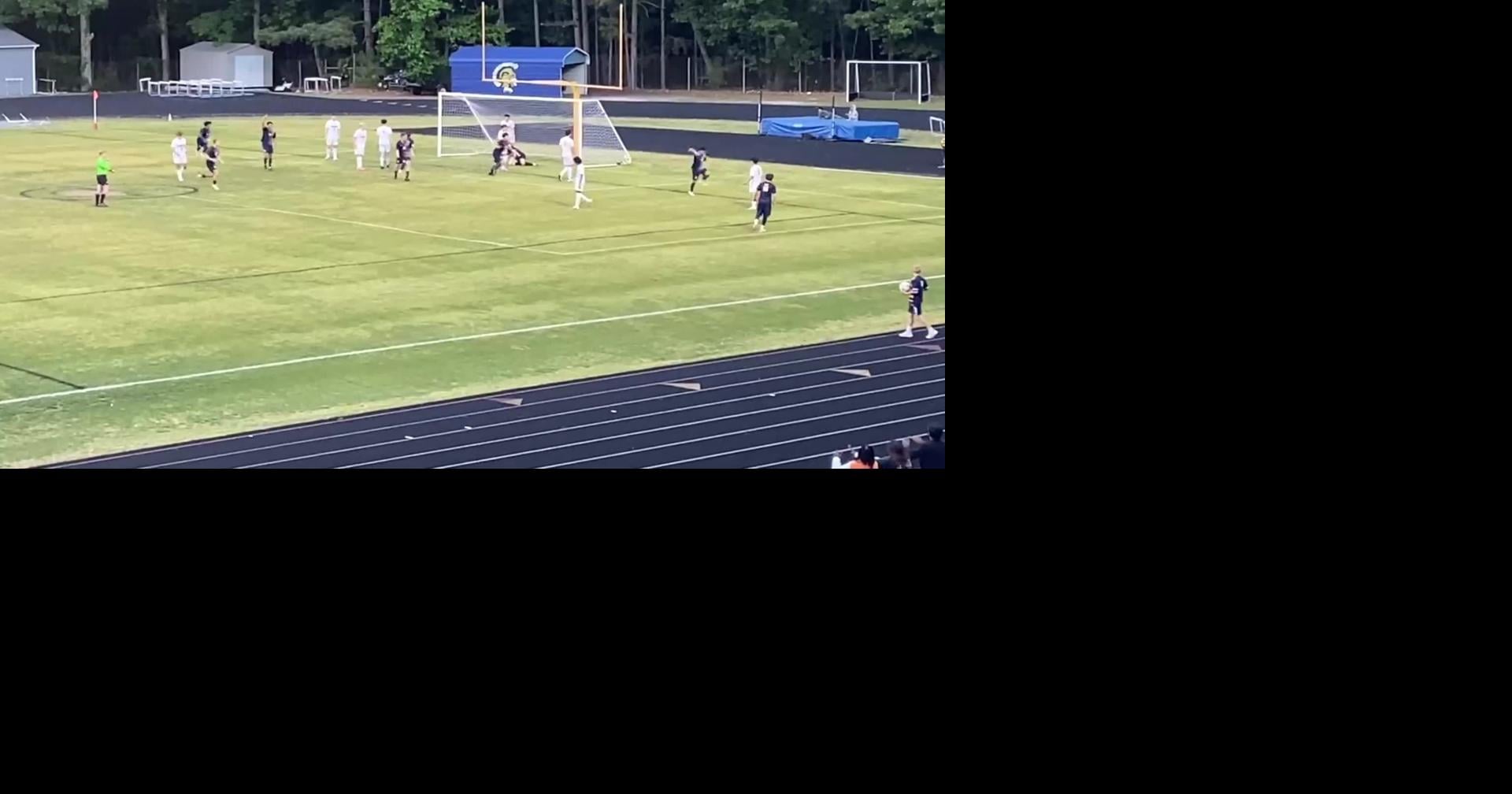 Midlothian boys soccer junior Aiden Livezey scores first of three goals in Trojans' 6-0 win over Mills Godwin