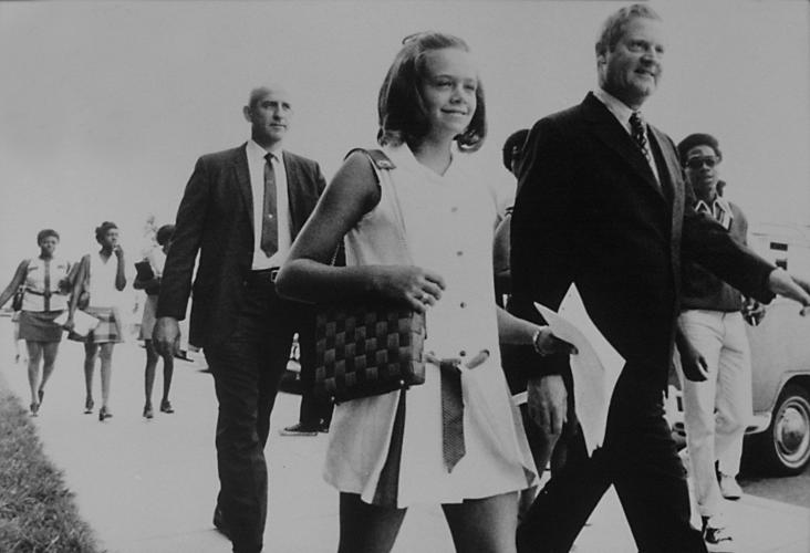 Holton walks daughter to school