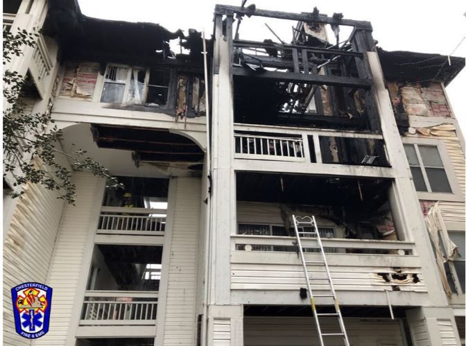 Fireplace Ashes Placed On Balcony In Plastic Container Sparked