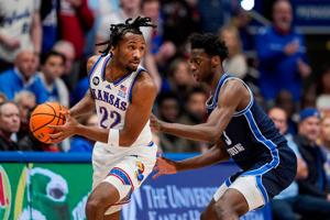 Kansas Jayhawks guard Darryn Peterson handles the ball against BYU Cougars forward AJ Dybantsa during the first half Jan. 31, 2026, in Lawrence, Kansas.