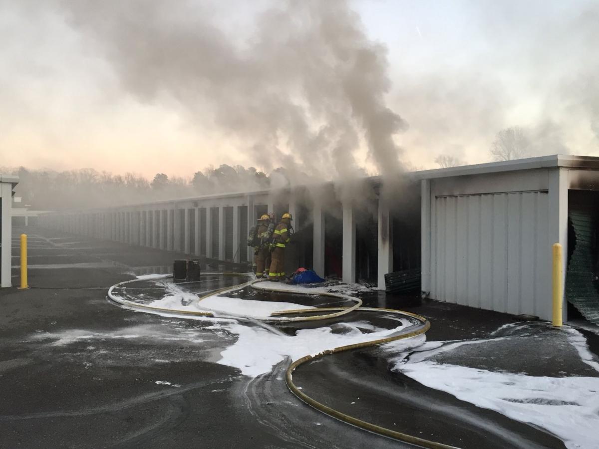 Chesterfield firefighters working 2 alarm blaze at storage facility off