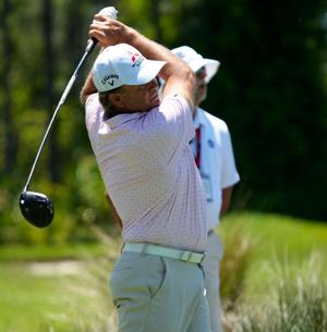 Retief Goosen from South Africa, hits his tee shot on the 13th hole. The second round of the Senior PGA Championship was held