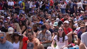US: US fans celebrate World Cup victory over Australia aboard USS Intrepid.