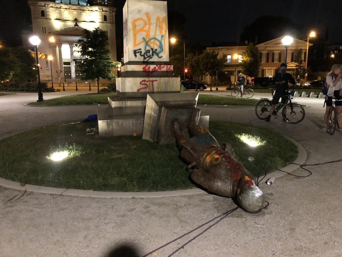 UPDATE Protesters pull down Confederate statue in Richmond's Monroe Park