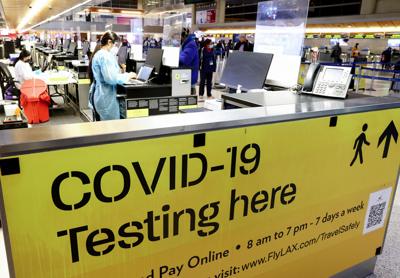 A COVID-19 test center operates inside the Tom Bradley International Terminal at Los Angeles International Airport on Dec. 1, 2021, in Los Angeles.