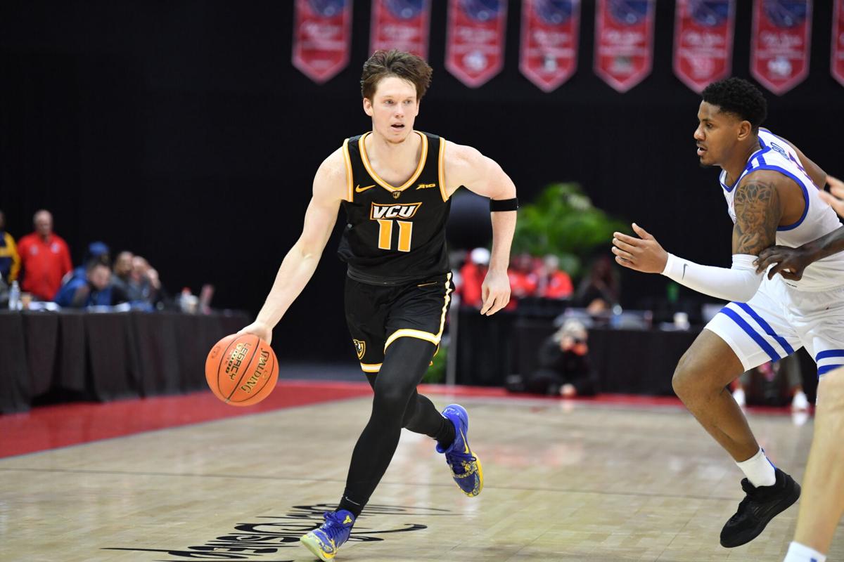 VCU basketball players Max Shulga, Tobi Lawal after 65-61 loss to Boise  State in ESPN Events Invitational