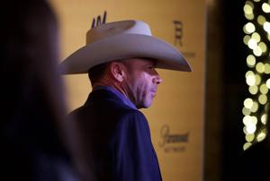 Taylor Sheridan walked down the red carpet event before a screening of "Yellowstone" Season 5 premiere on Nov. 13, 2022, at Hotel Drover in Fort Worth, Texas.