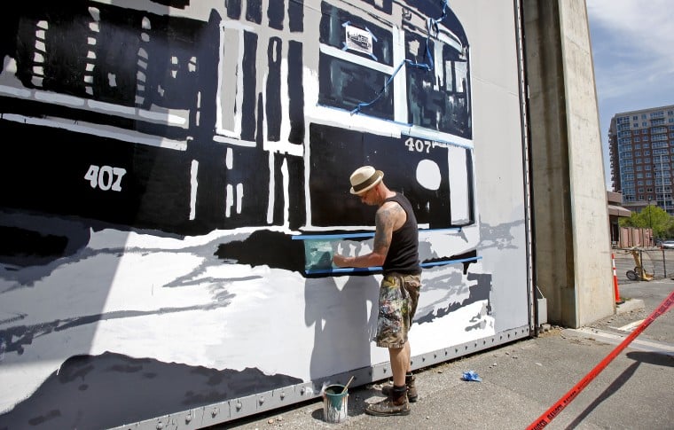 Public murals bring life to old building