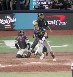 Milwaukee Brewers shortstop Cooper Pratt (12) hits a go ahead solo home run off of Tampa Bay Rays pitcher Ian Seymour (61)