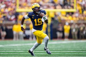 Michigan quarterback Bryce Underwood (19) runs against Oklahoma during the first half at Michigan Stadium in Ann Arbor on Saturday, Sept. 12, 2026.