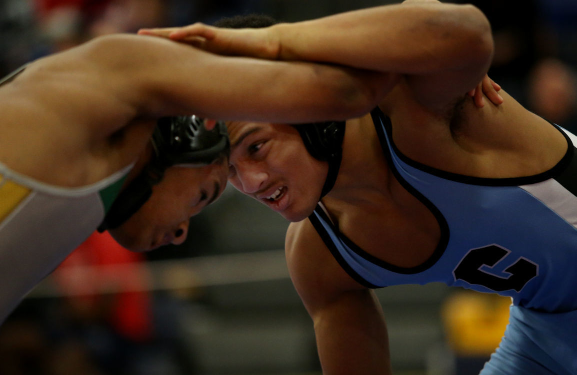 Brothers Jah'Quez and Simeone Holmes have put themselves in the Cosby  wrestling record book