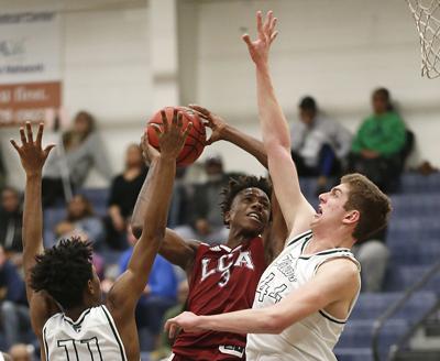 Burke Smith Uses 6 11 Frame To Help Trinity Episcopal Beat Life