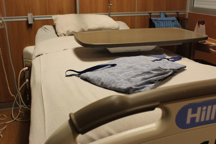 Copper Foot Rail, Linens & Bedside Table