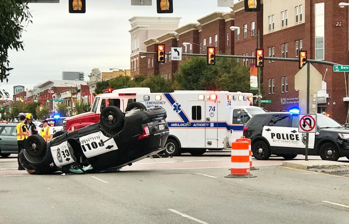 PHOTOS Police car flipped in crash in downtown Richmond