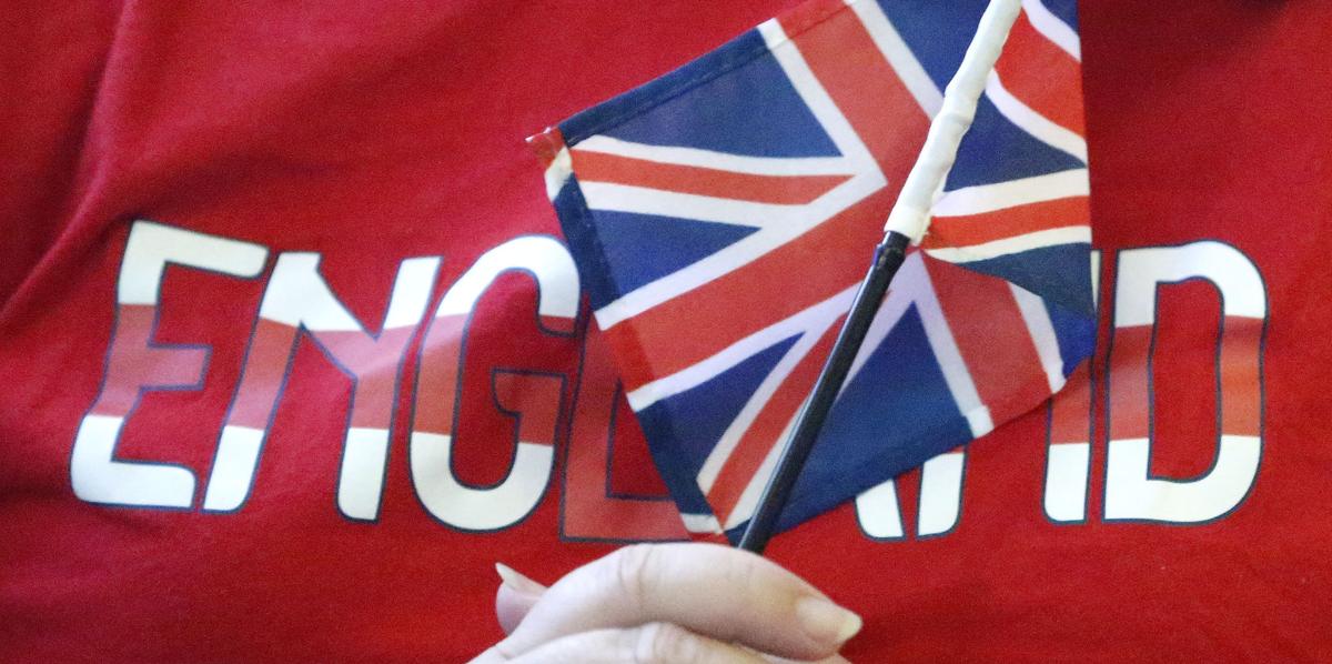 PHOTOS: Soccer fans come to Penny Lane to watch England ...