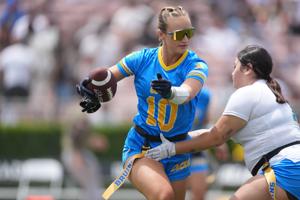 May 2, 2026; Pasadena, CA, USA; Members of the UCLA Bruins women's flag football club team participate in an exhibition during the spring game at Rose Bowl.