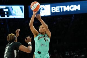 Jun 23, 2026; Las Vegas, Nevada, USA; New York Liberty guard-forward Betnijah Laney-Hamilton (44) shoots the ball against Las Vegas Aces forward NaLyssa Smith (3) during the third quarter of a WNBA basketball game at Michelob Ultra Arena. Mandatory C
