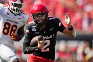 Oct 4, 2025; Cincinnati, Ohio, USA; Cincinnati Bearcats quarterback Brendan Sorsby (2) runs with the ball against the Iowa State Cyclones in the first half at Nippert Stadium. Mandatory Credit: Aaron Doster-Imagn Images