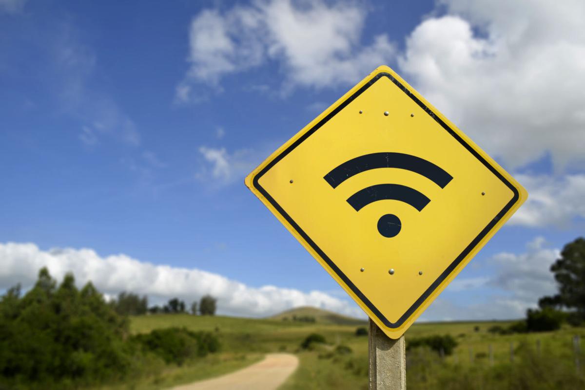 Wifi access road sign concept in rural area