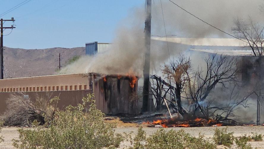 Power pole fire spreads to nearby storage facility News