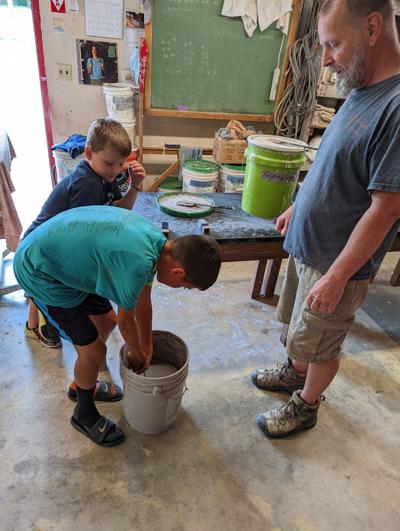 Roly Boni teaching pottery
