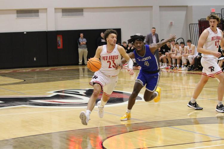 Red-Hot Red Hawks Stave Off Men's Hoops - The College of New