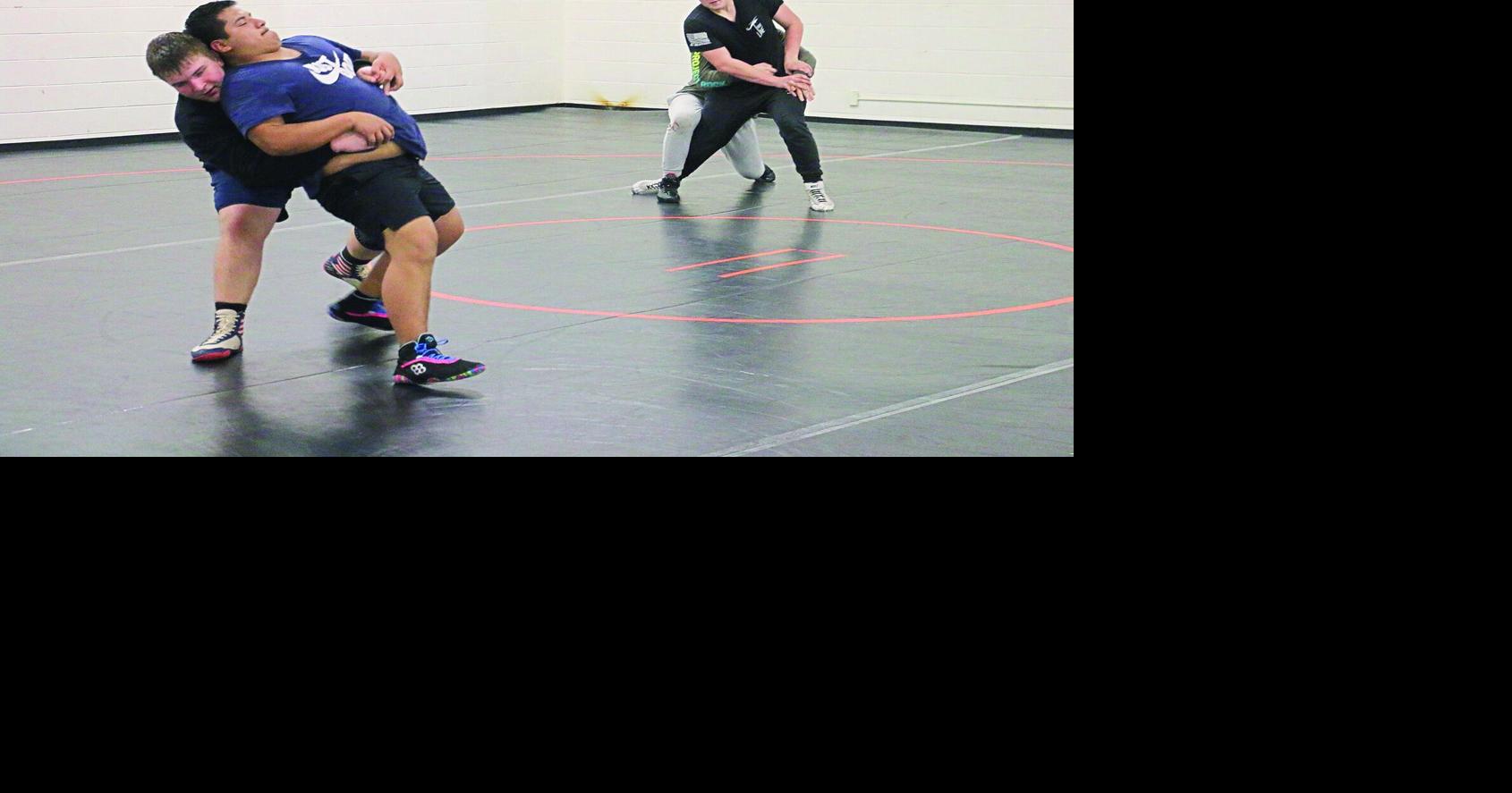 New faces and returning veterans boost Ripon wrestling team's optimism