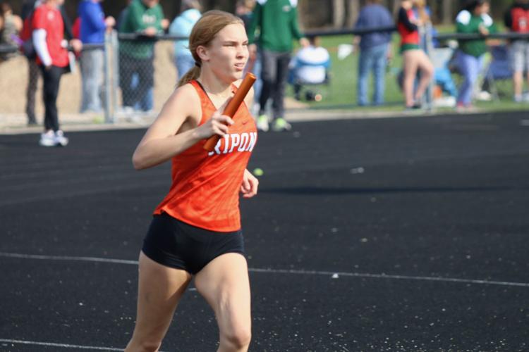 Raising the bar Ripon Tiger track and field teams record 23 PRs at Tom