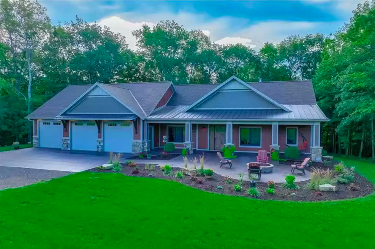 PHOTOS Custom house on eight acres for sale in River Falls Real